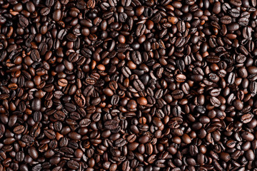 Roasted coffee beans with background.