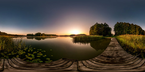 full seamless spherical hdri panorama 360 degrees  angle view on wooden pier of huge lake or river...