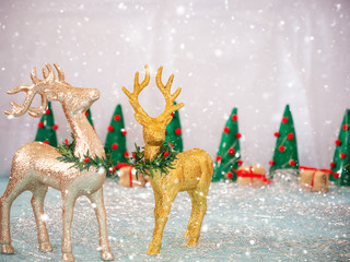 Christmas or Happy New Year background with deers, christmas trees and gift boxes