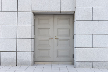 sidewalk by street wall & door