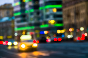 Fototapeta na wymiar Abstract blurred background of evening city.Night traffic,colorful lights