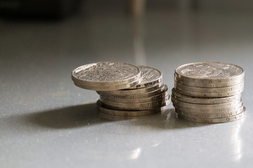 stacks of coins on a gray background.Soviet jubilee rubles