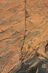 Sunlit rock with cracks possible marble for background 4