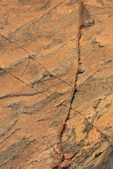 Sunlit rock with cracks possible marble for background 3