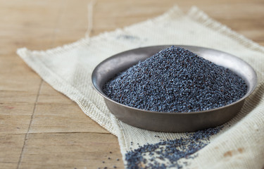 Blue poppy. Dried poppy heads and seeds. Blue poppy in bowl