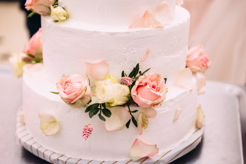 Wedding cake with fresh flowers. Holiday cake