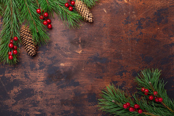 Christmas background with fir tree branches and holly. View from above. Copy space - Image