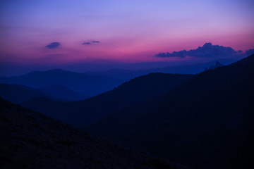 Violet sunset high in the mountains