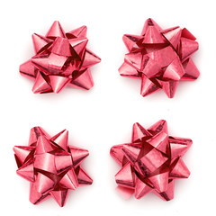 Christmas shiny pink present bow isolated. Set of Christmas gift ribbon bow