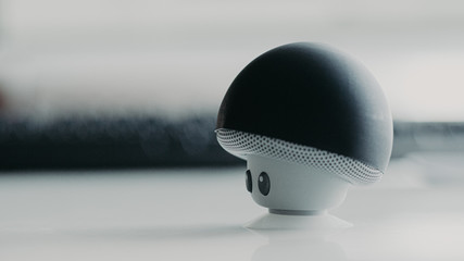 A portable speaker in the form of a small mushroom. A beautiful design and good creativity of the inventor.