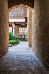 Stone bricks vaulted entrance of historic Beit El Sehemy house, Cairo, Egypt