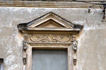 decorations in the windows of old houses