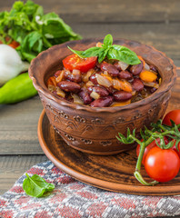 Lobio with red beans. Traditional Georgian dish of stewed beans and walnuts close-up