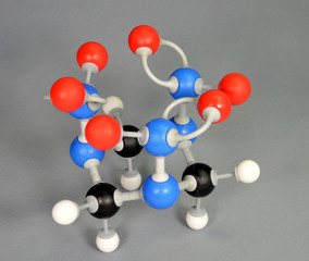 Molecule model of C4 explosive. (Cyclonite) White is Hydrogen, black is Carbon, red is Oxygen, White is Hydrogen, black is Carbon, red is Oxygen, and blue is Nitrogen.