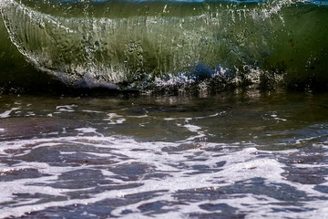 Obraz premium Background oncoming approaching powerful sea wave.