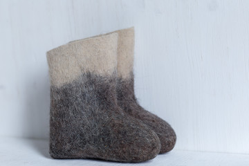 boots on a light background, shot indoors in the light from the window