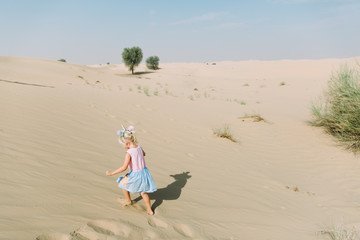 Little girl in the desert in UAE