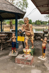 Bang Saen, Thailand - March 16, 2019: Wang Saensuk Buddhist Monastery. Colorful group of statues of...