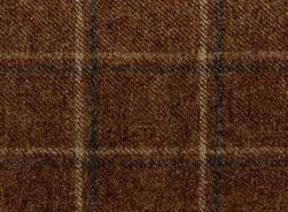 Brown woolen fabric. Country windowpane tweed riding jacket. Shetland wool. Expensive men's suit fabric. High resolution