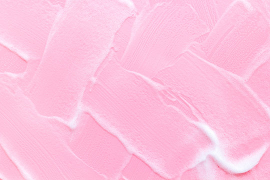 Foam backgroud on pink table top view copy space