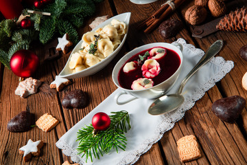 Barszcz (beetroot soup) with small pierogi