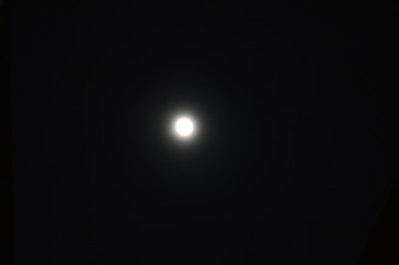 Full moon on dark sky at night