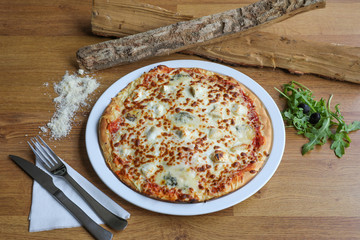 Fresh pizza cooked in wood fires