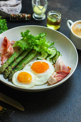 healthy breakfast (fried eggs, bacon, vegetables, asparagus beans, coffee and more) menu concept. food background. copy space. Top view