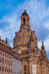 Fototapeta na wymiar frauenkirche in dresden with blue sky and some clouds at sunset in summer