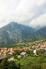 Fototapeta na wymiar Village at the foot of the mountains