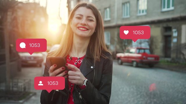Young woman with red lipstick use phone feel happy at sunlight vlogger influencer animation with user interface - likes, followers, comments for social media from smartphone slow motion