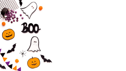 Halloween conceptual background with paper ghosts and pumpkins