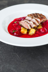 duck breast meat and berry sauce (fine dining) bon appetit. top food background. copy space. Top view