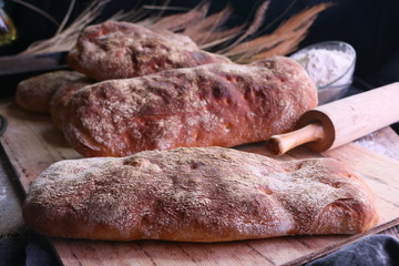 Bread loaves on wooden board