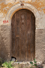 Fototapeta na wymiar Old wooden Door at Mustafapasa, Cappadocia, Turkey
