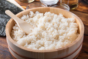 jaoanese sushi rice in wooden bowl with ingredients © ahirao