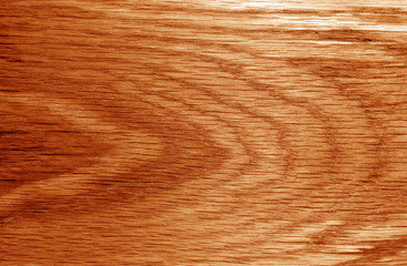 Wooden board texture in orange tone.
