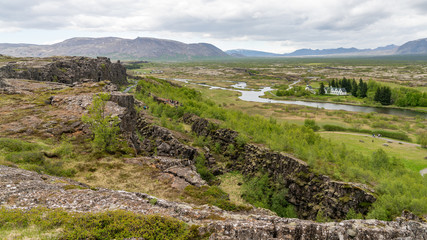 View of tectonic plates and creek in Thingvellir National Park in Iceland