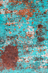 a sheet of metal was coated with paint then painted a different color. time destroyed the coating appeared rust. tectura.