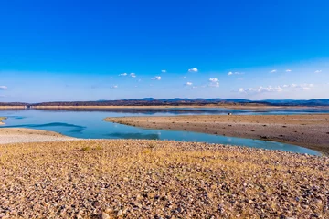Fototapeten Reservoir almost empty due to drought © Gelpi