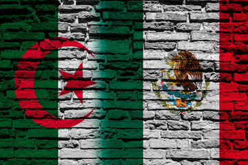 Flag of Algeria and Mexico on brick wall