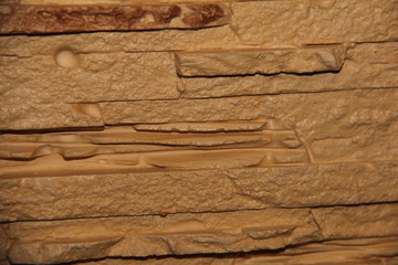 background of stone beige, dark brown