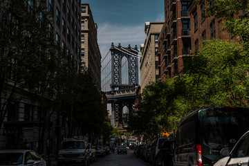 Naklejka premium View of one of the towers of the Manhattan Bridge from the streets of the DUMBO district, Brooklyn, NYC 
