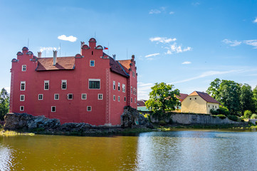 Obraz premium Cervena Lhota - romantic water chateau or castle in Czech Republic (czechia), popular travel destination in Europe