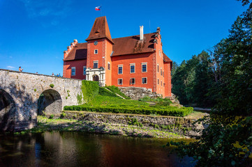 Fototapeta na wymiar Cervena Lhota - romantic water chateau or castle in Czech Republic (czechia), popular travel destination in Europe