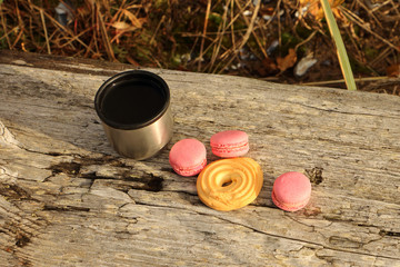 autumn picnic tea with cookies and macaroons