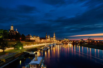 Fototapeta na wymiar Moody shot of Dresden skyline with the river Elbe and colorful reflections