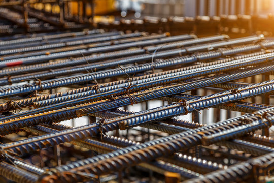 Industrial background. Rebar texture. Rusty rebar for concrete pouring. Steel reinforcement bars. Construction rebar steel work reinforcement. Closeup of Steel rebars.