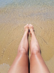 feet on the beach