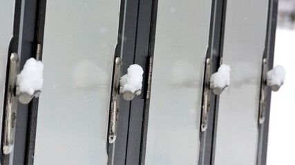 snow on the door handles